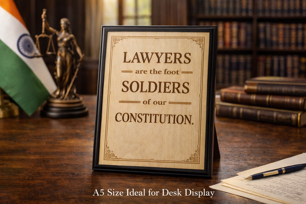 A5 wooden laser engraved plaque reading “Lawyers Are the Foot Soldiers of Our Constitution” in bold typography, framed in black with desk stand support, suitable for law offices, advocate chambers, and constitutional law professionals.